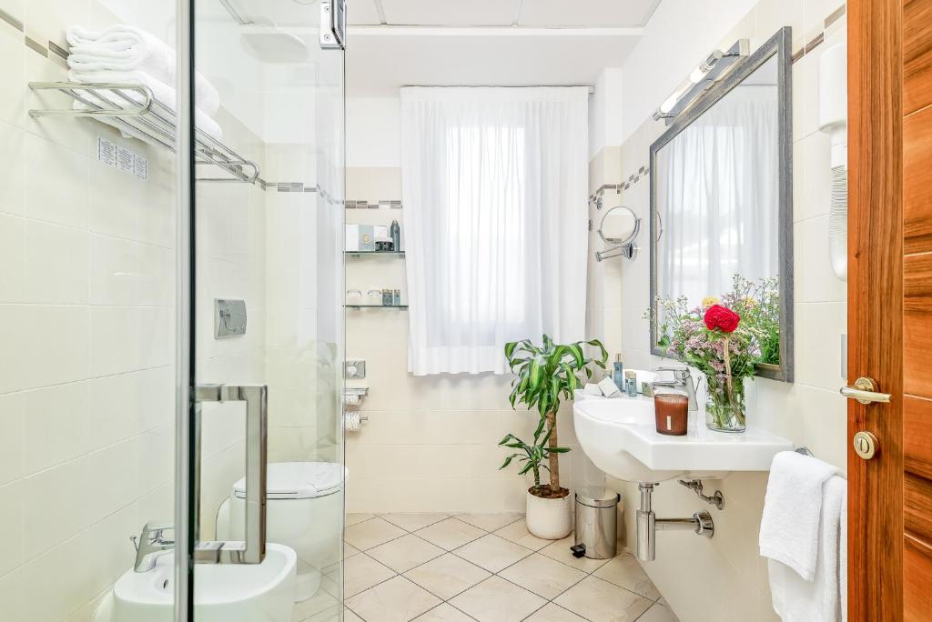 Ein Badezimmer in der Unterkunft Park Hotel Argento