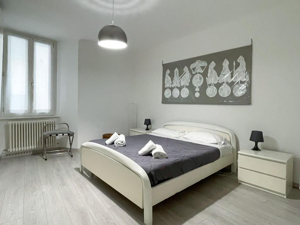 Posteľ alebo postele v izbe v ubytovaní Paloma center town apartment