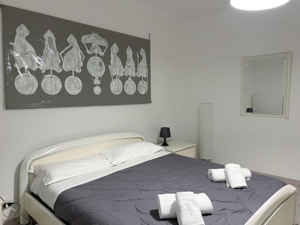 Posteľ alebo postele v izbe v ubytovaní Paloma center town apartment