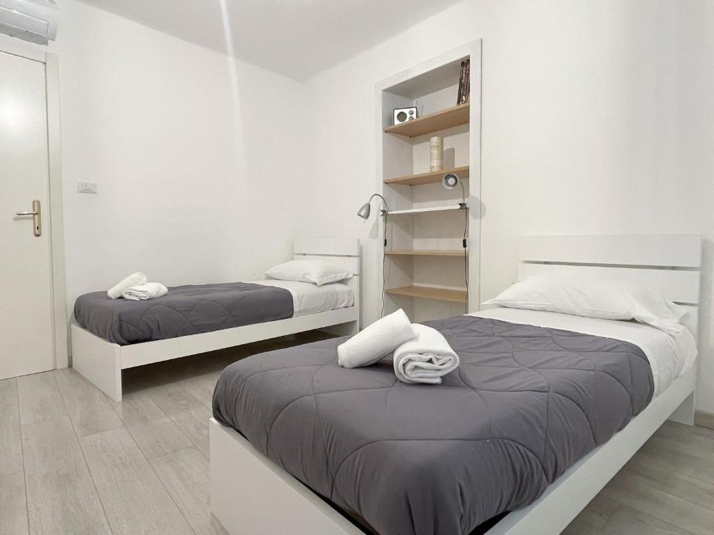 Posteľ alebo postele v izbe v ubytovaní Paloma center town apartment