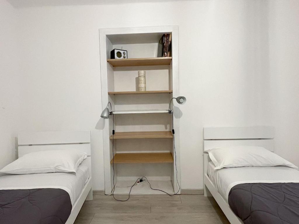 Posteľ alebo postele v izbe v ubytovaní Paloma center town apartment