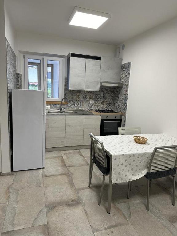 A kitchen or kitchenette at La corte dell'ulivo