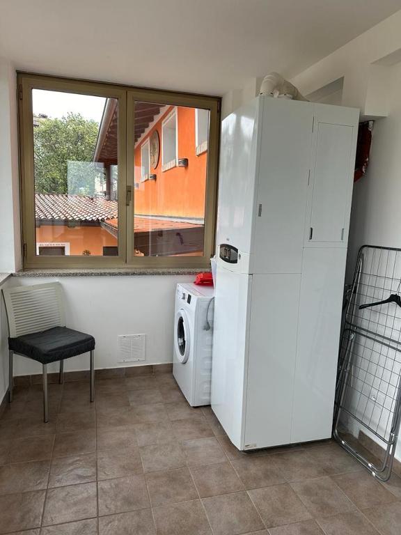 A kitchen or kitchenette at La corte dell'ulivo