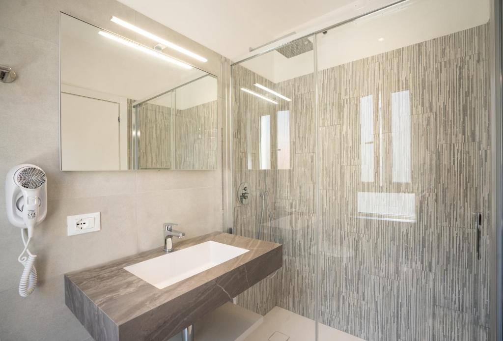 Koupelna v ubytování Hotel Laurin