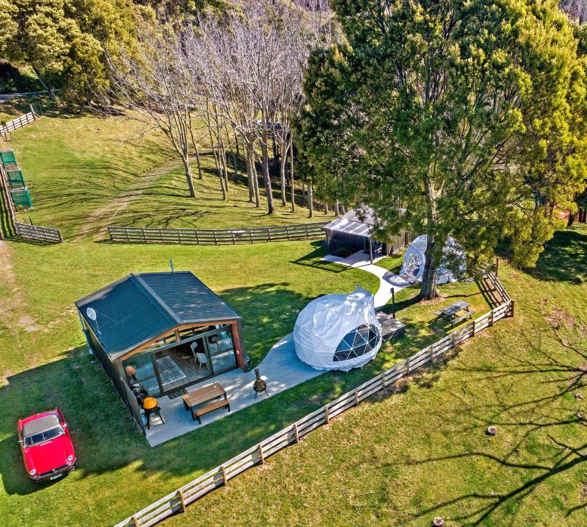an overhead view of a tent in a field at Black Label Retreats in Gisborne