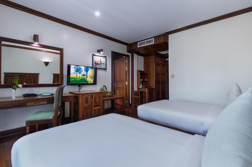 TV a/nebo společenská místnost v ubytování Pierre Hotel