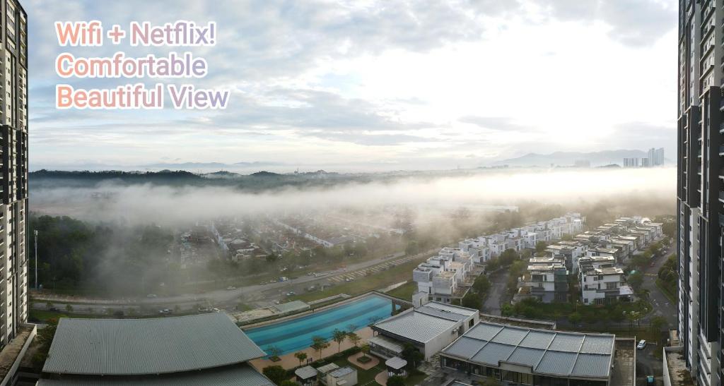 arial view of a city in the fog at HMM Lili - Nilai in Nilai