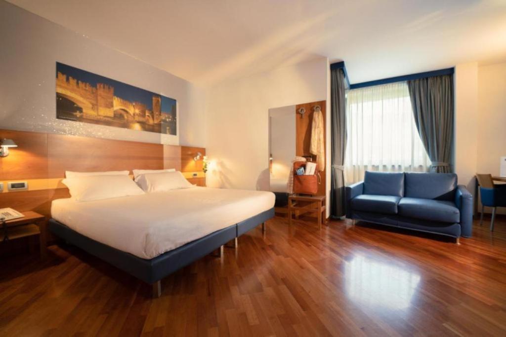 Postel nebo postele na pokoji v ubytování Best Western Hotel Fiera Verona