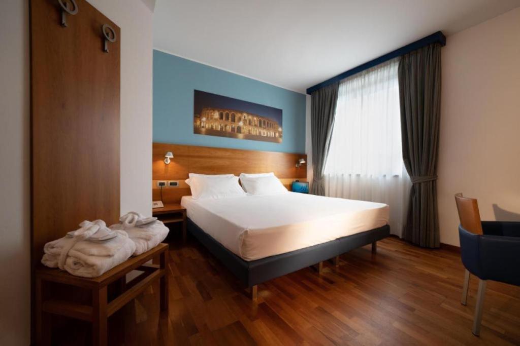 Postel nebo postele na pokoji v ubytování Best Western Hotel Fiera Verona