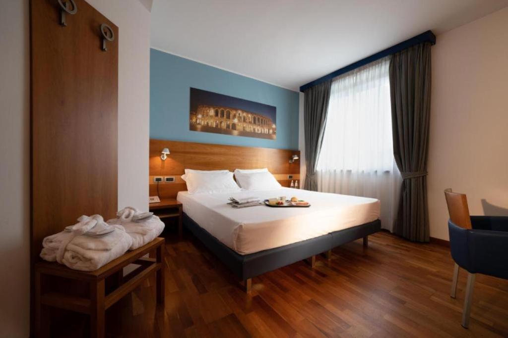 Postel nebo postele na pokoji v ubytování Best Western Hotel Fiera Verona