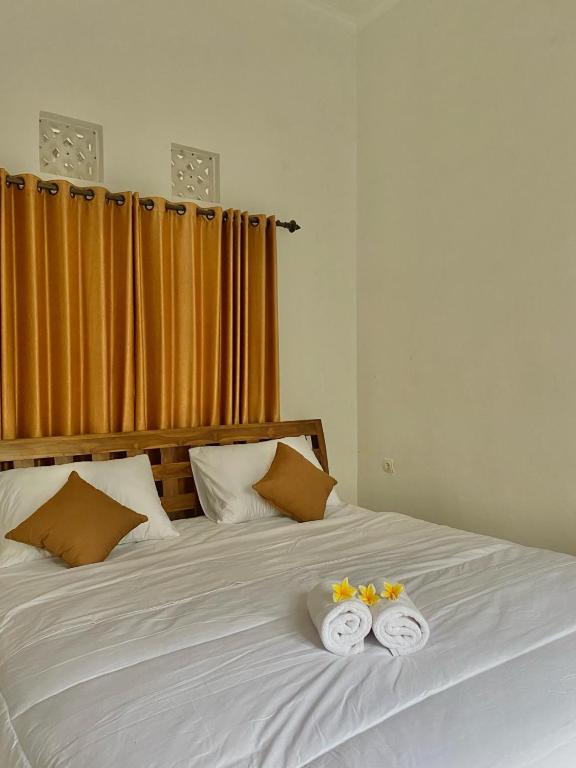 Postel nebo postele na pokoji v ubytování Kopi Bali House With Private Pool