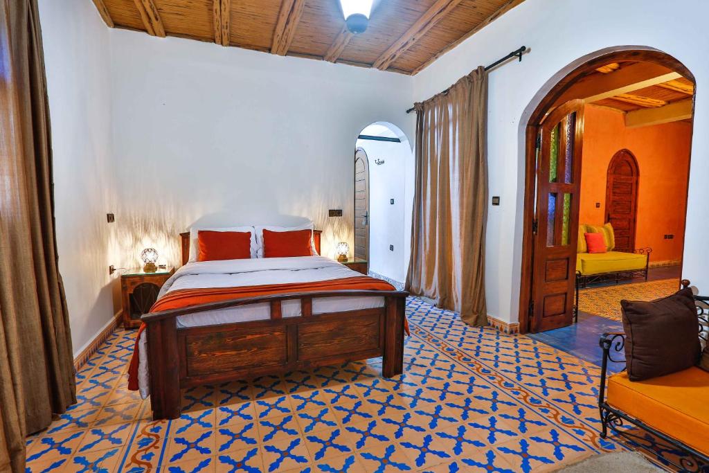 Postel nebo postele na pokoji v ubytování DAR ETTO Riad & Spa