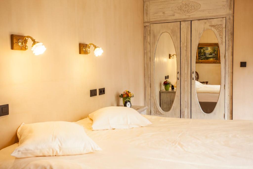 Postel nebo postele na pokoji v ubytování Thermae Boetfort Hotel