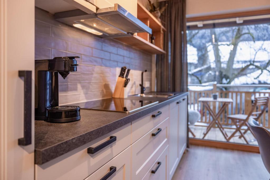 Kuchyň nebo kuchyňský kout v ubytování Landhaus Jenul