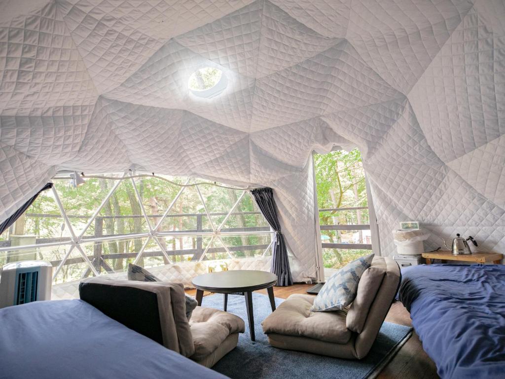 Posezení v ubytování Nagano GLAMPINGBASE enCamp