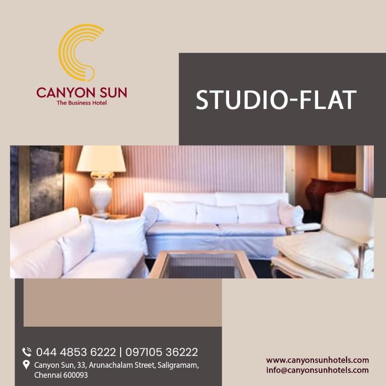 a brochure of a hotel room with a bed and chairs at Canyon sun in Chennai