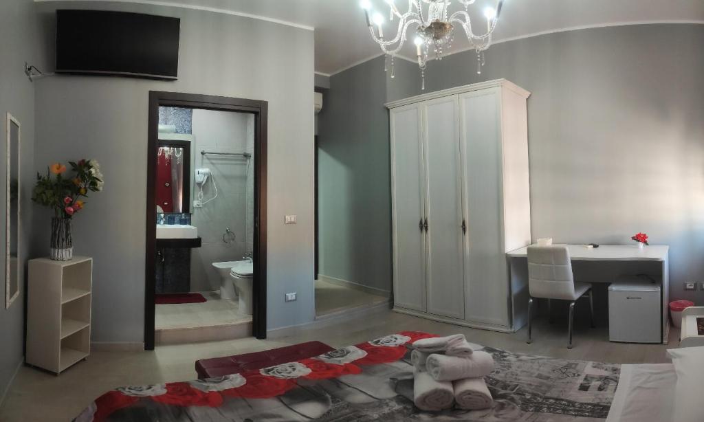 Postel nebo postele na pokoji v ubytování Guest House Elettra