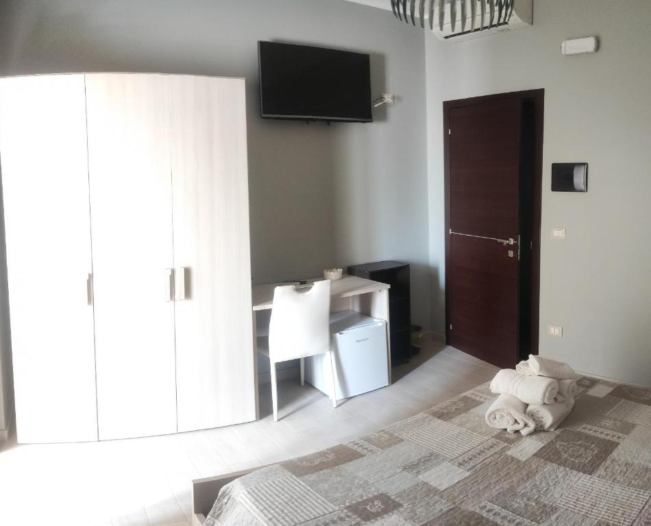 TV a/nebo společenská místnost v ubytování Guest House Elettra