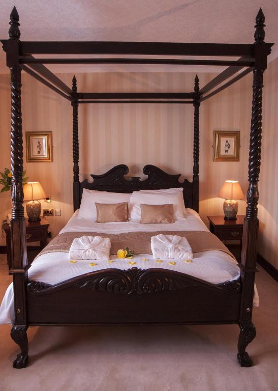 Krevet ili kreveti u jedinici u okviru objekta Seven Oaks Hotel