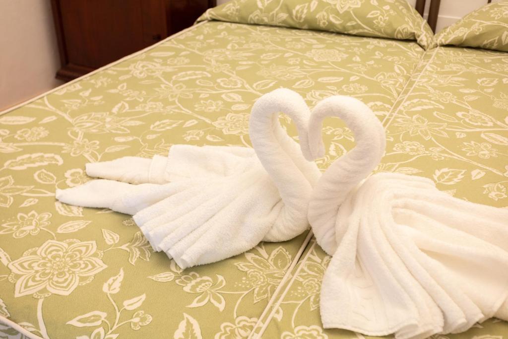 A bed or beds in a room at El Estanco 14