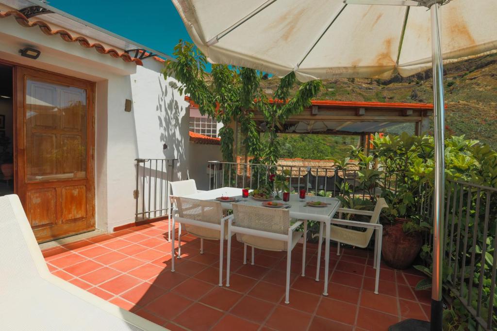 A patio or other outdoor area at El Estanco 14