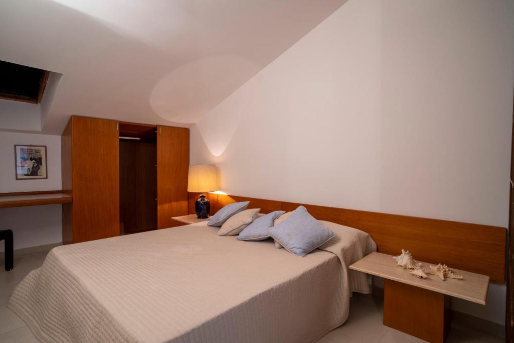 Postel nebo postele na pokoji v ubytování Miramare apartments