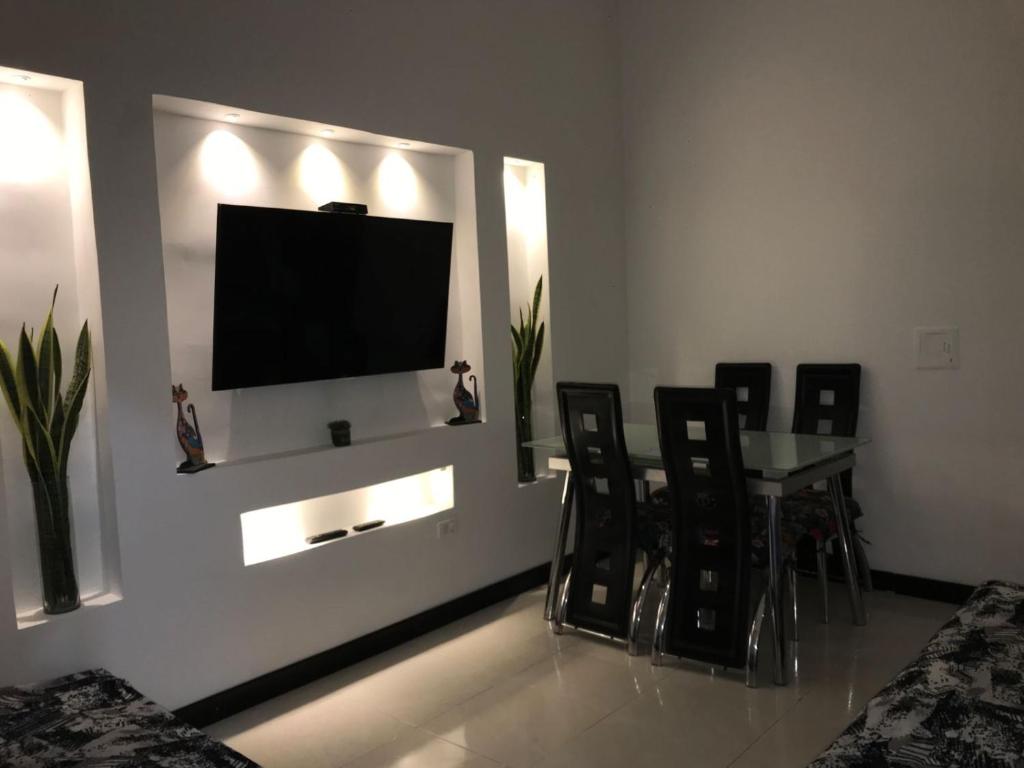 TV a/nebo společenská místnost v ubytování Casa_22_Melgar