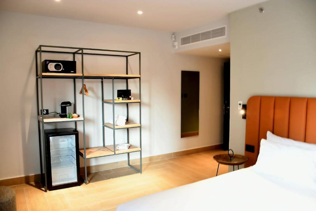 Postel nebo postele na pokoji v ubytování Hotel Shoshana - Adults Only