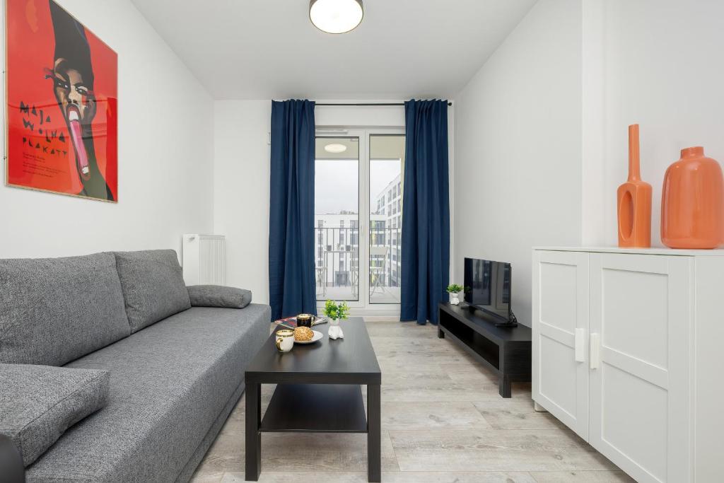 Кът за сядане в Modern Targowek Apartment by Renters