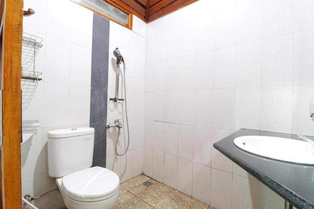 Koupelna v ubytování Grand Nirwana Resort Lembang