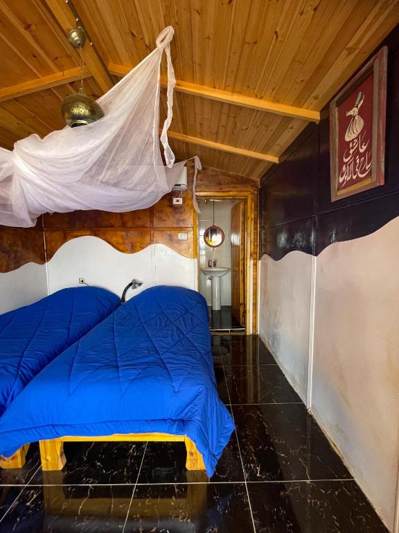 Postel nebo postele na pokoji v ubytování Live the bedouinlife