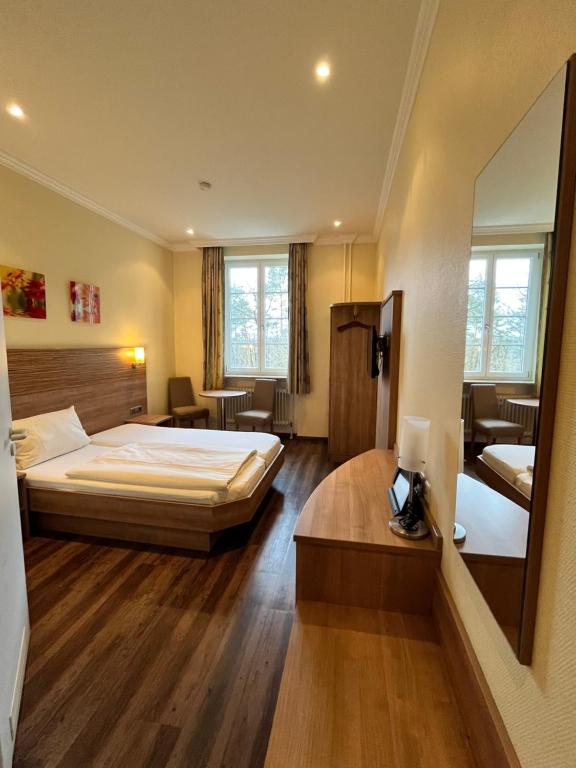Postel nebo postele na pokoji v ubytování Haus Neugebauer-Gästehaus Garni