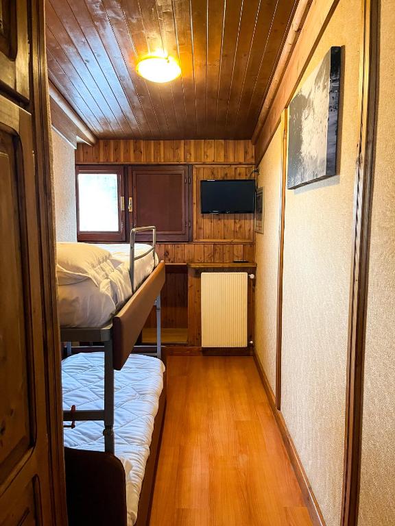 Postel nebo postele na pokoji v ubytování Hotel Togo Monte Terminillo