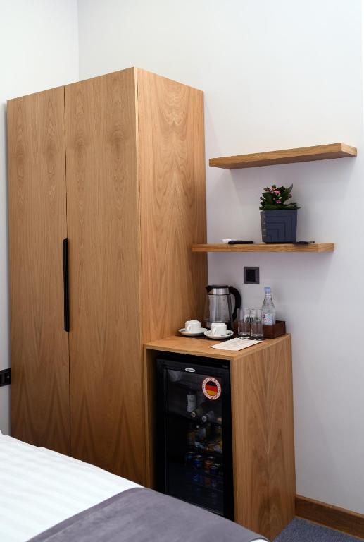 Kuchyň nebo kuchyňský kout v ubytování Revive Boutique Hotel