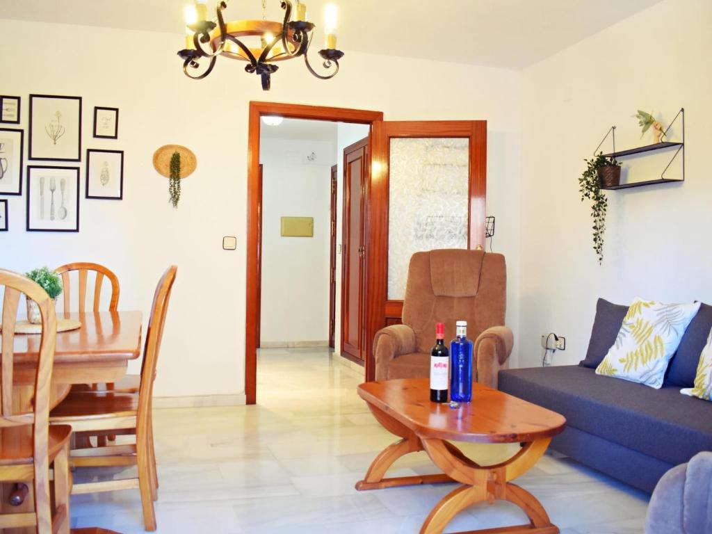 Posezení v ubytování Amplio y luminoso apartamento cerca del centro y la playa con piscina y parking privado