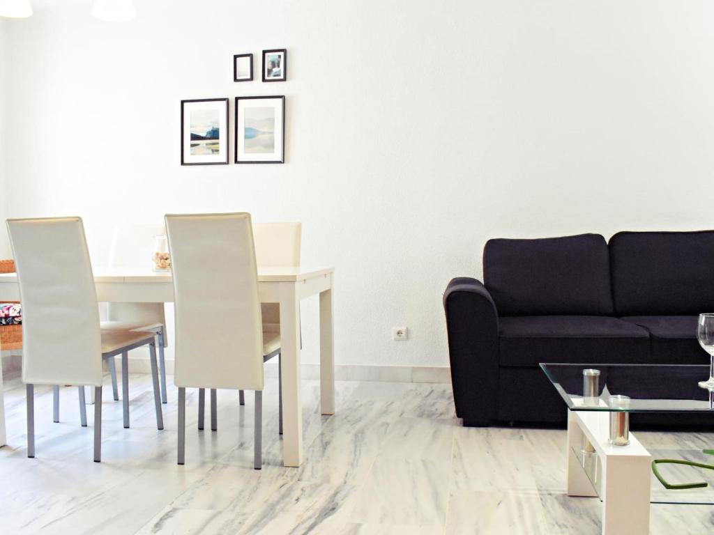 Posedenie v ubytovaní Fabuloso apartamento junto al Soho con parking privado