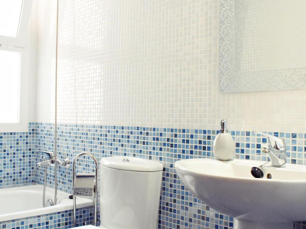 Kúpeľňa v ubytovaní Fabuloso apartamento junto al Soho con parking privado