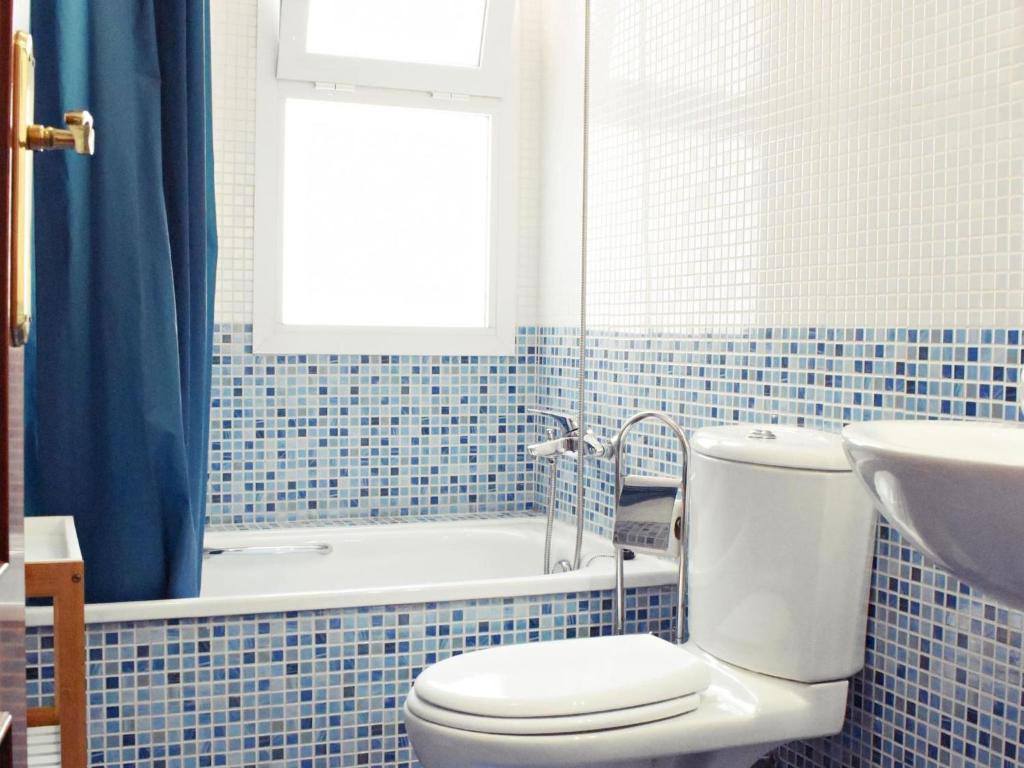 Kúpeľňa v ubytovaní Fabuloso apartamento junto al Soho con parking privado