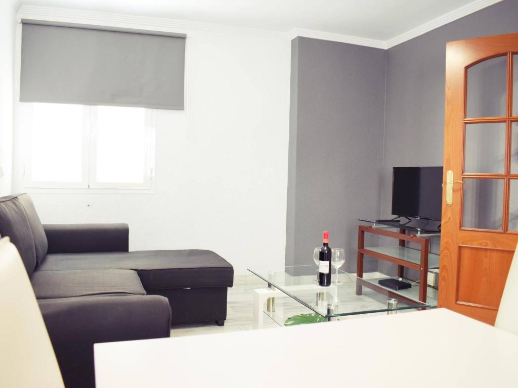Televízia a/alebo spoločenská miestnosť v ubytovaní Fabuloso apartamento junto al Soho con parking privado