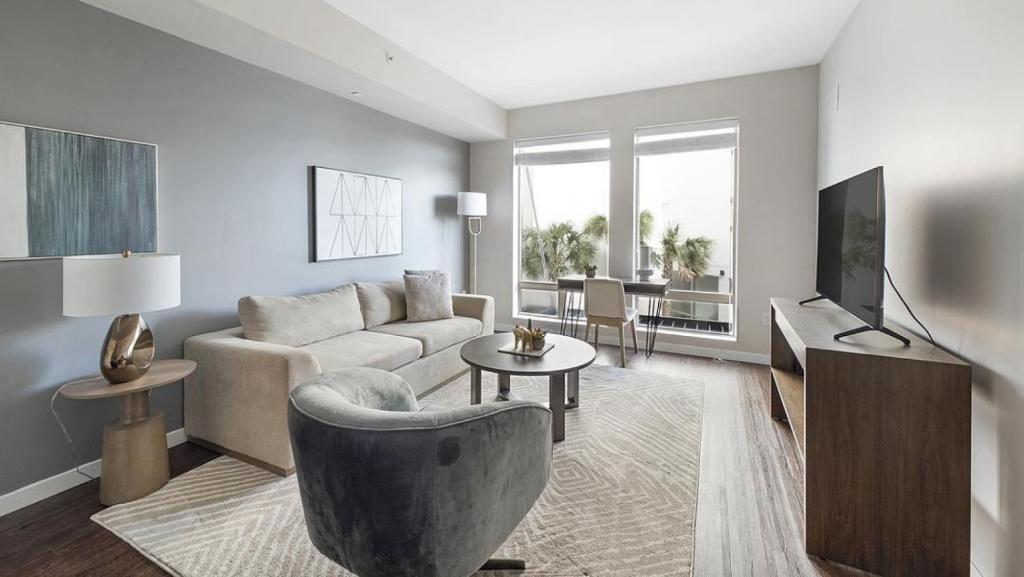 A seating area at Landing Modern Apartment with Amazing Amenities (ID8377X25)