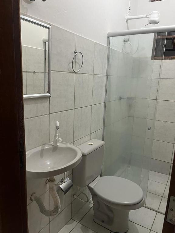 Koupelna v ubytování Apartamentos completos no centro - vista mar