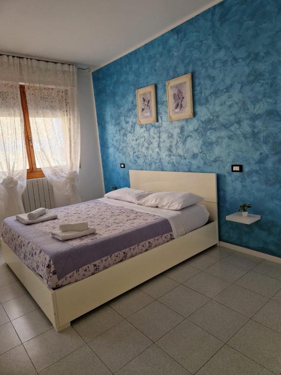 Posteľ alebo postele v izbe v ubytovaní CASA SOSSI
