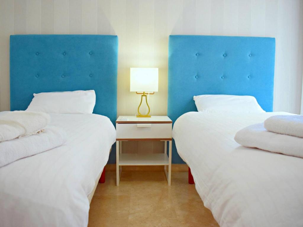 Posteľ alebo postele v izbe v ubytovaní Fantástico apartamento de dos dormitorios en el Soho