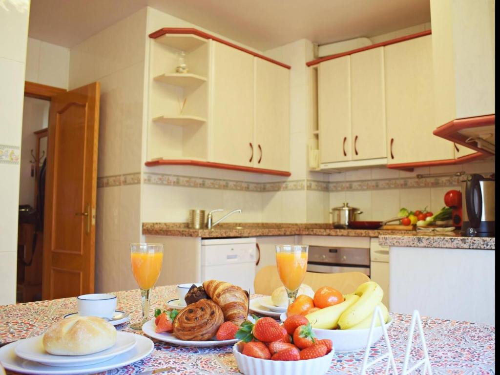 Kuchyňa alebo kuchynka v ubytovaní Fantástico apartamento de dos dormitorios en el Soho