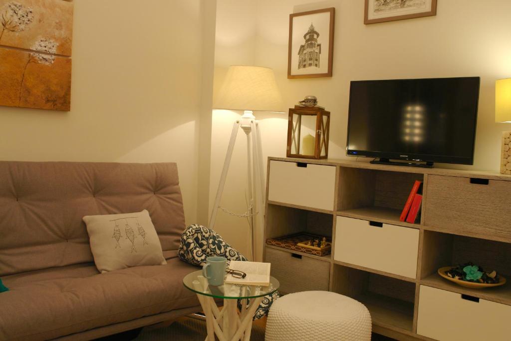 A television and/or entertainment centre at Moderno y Centrico Apartamento 1 dormitorio