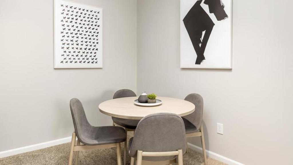 a dining room with a table and chairs at Landing - Modern Apartment with Amazing Amenities (ID8701X65) in Dublin