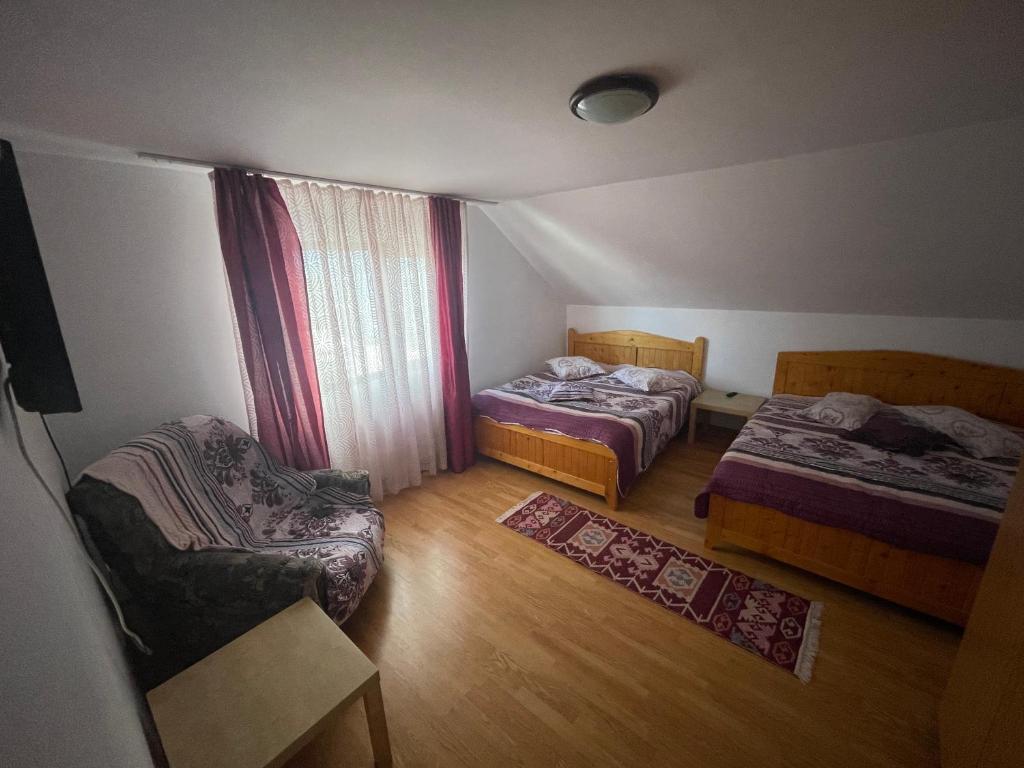 Postel nebo postele na pokoji v ubytování Cabana Fundata
