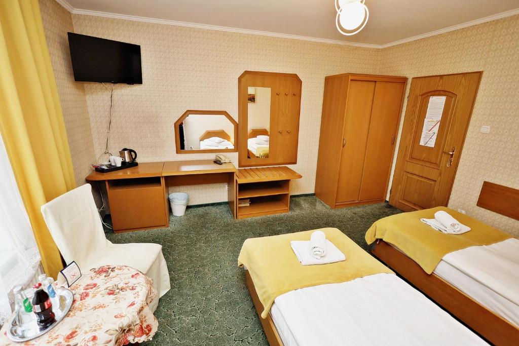 Postel nebo postele na pokoji v ubytování Bed&Breakfast Maciejanka