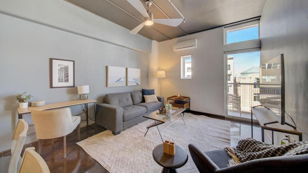 a living room with a couch and a table at Landing - Modern Apartment with Amazing Amenities (ID7845X46) in Sparks