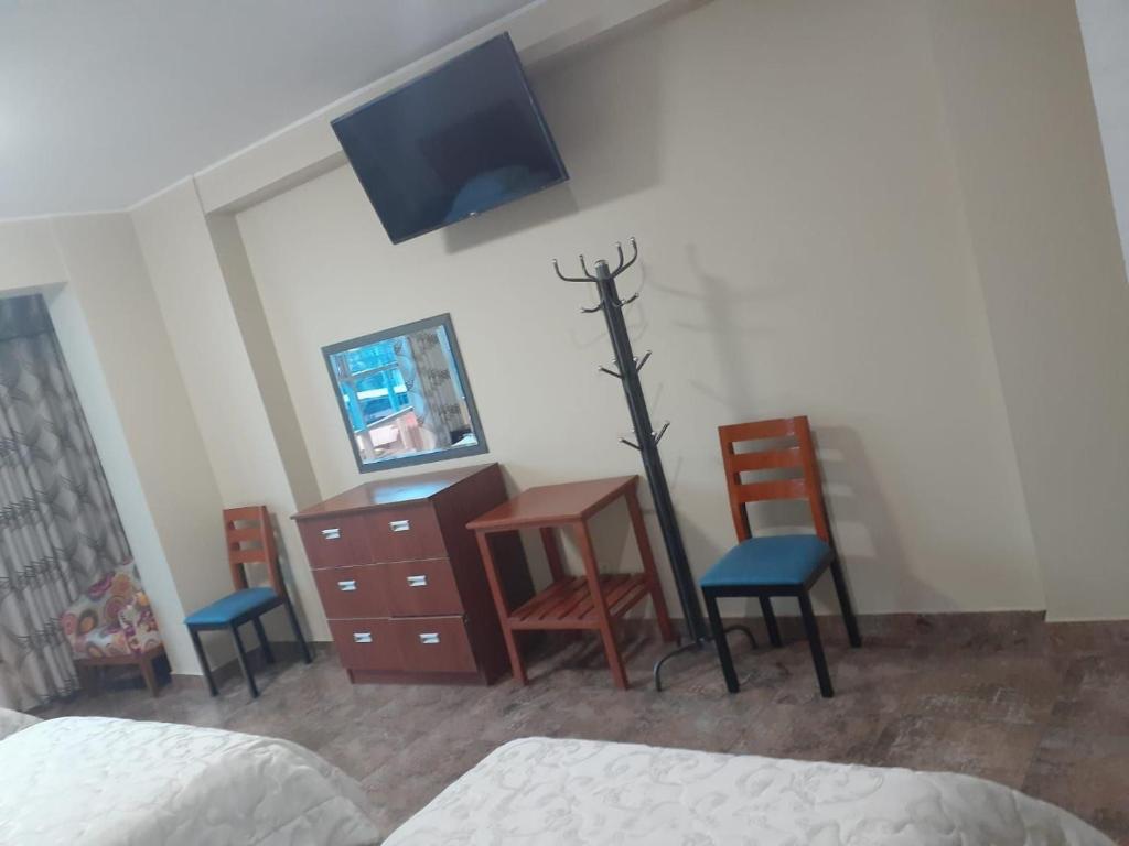Postel nebo postele na pokoji v ubytování HOTEL REAL PALACE CHURIN